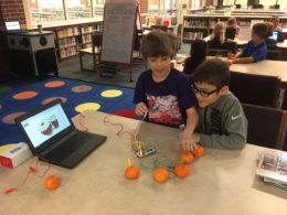 Students trying out MakeyMakey circuits